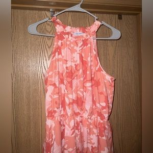 High neck midi dress. Higher in the front than the back. Never worn.